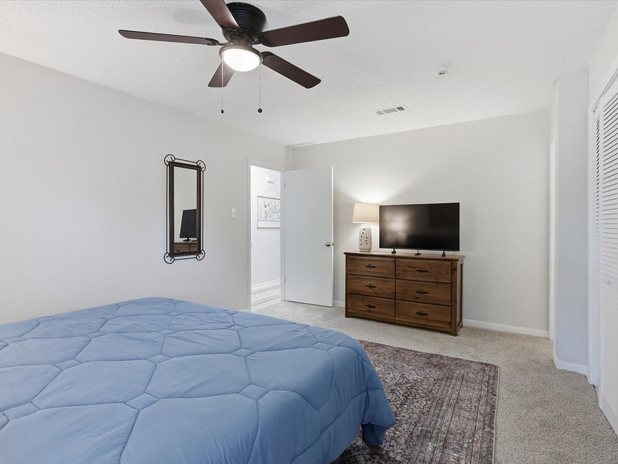 Primary bedroom has king size bed and 2 large closets.