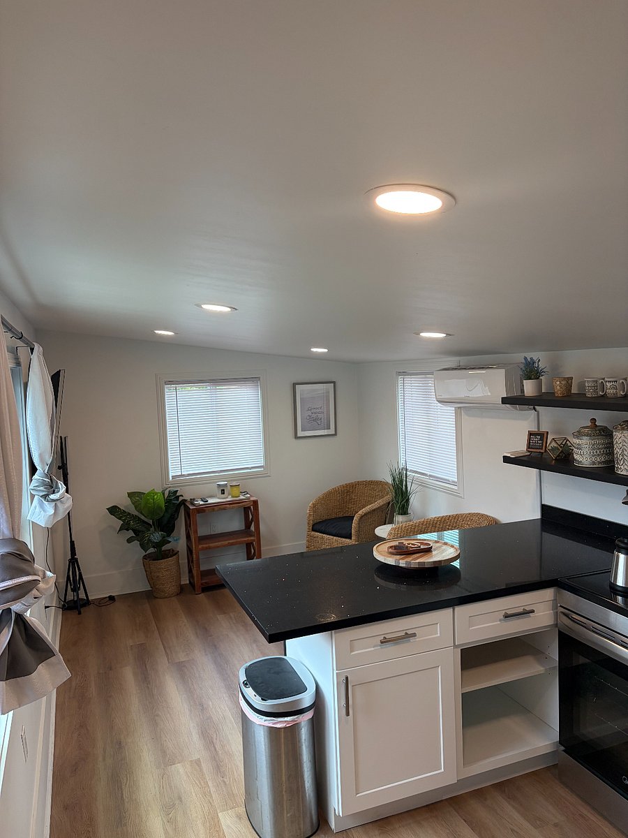 Living Room with Breakfast Bar and 55in SmartTV