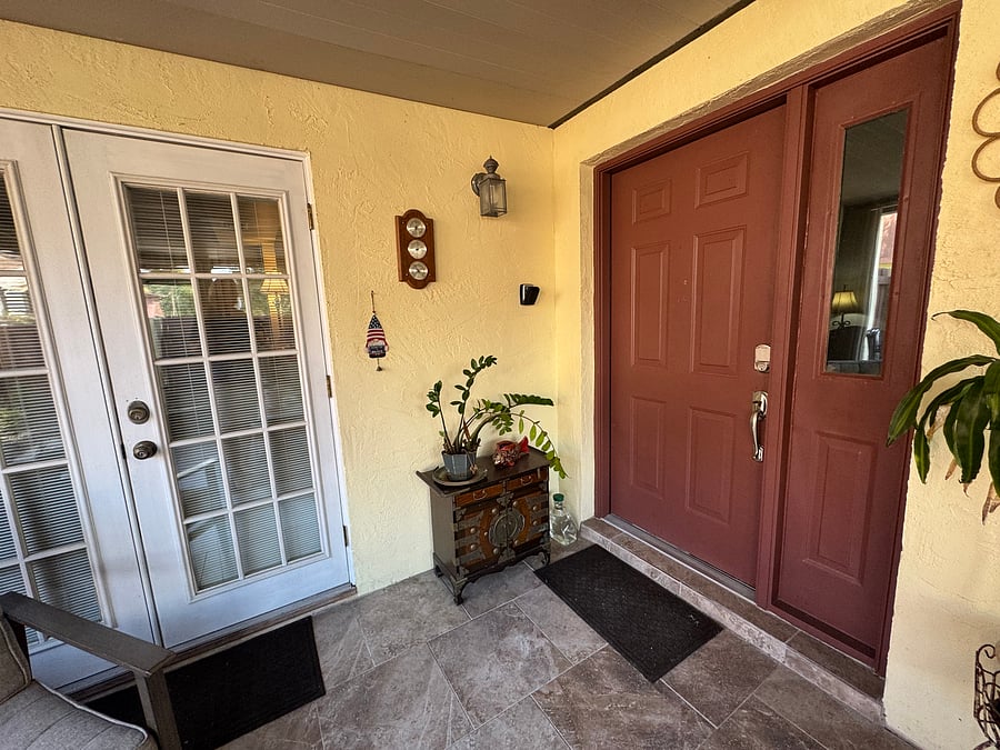 Main entrance in screened porch