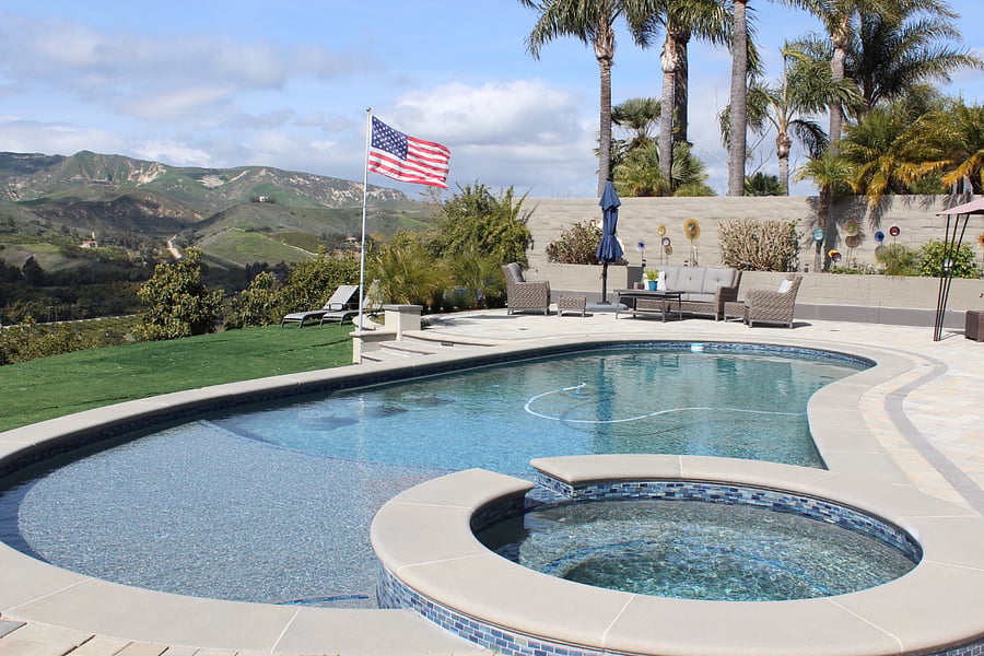 Pool, jacuzzi, outdoor furniture, BBQ, and cuddly male and female Rottweilers to share the space.