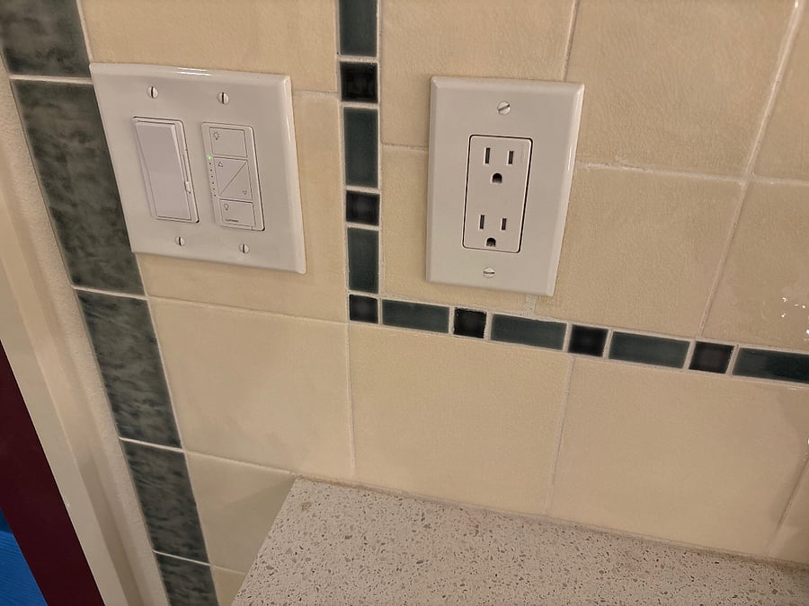 charming Ann Sachs tile delineates kitchen area, outlets abound, lights all have dimmers