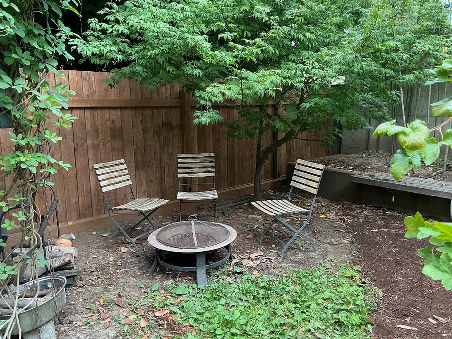 fire pit and additional seating in garden