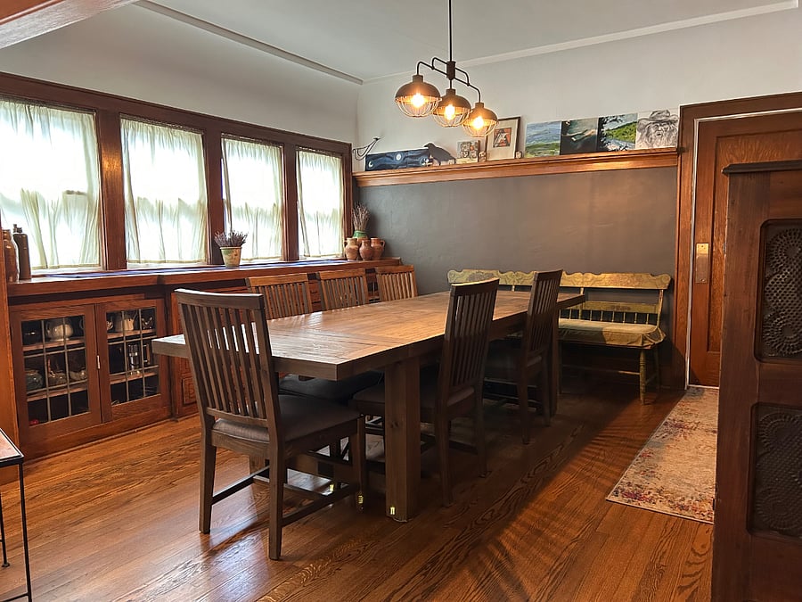Dining room with table that seats six or doubles as an office area