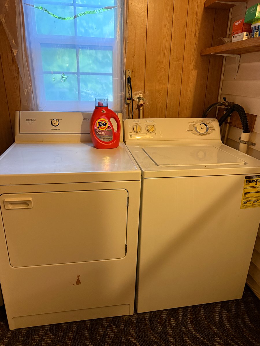 On site washer and dryer right off of the kitchen. There is a big step down into this room. 