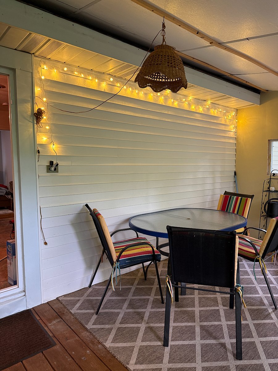 String lights to enjoy the porch in evenings as well as a table.