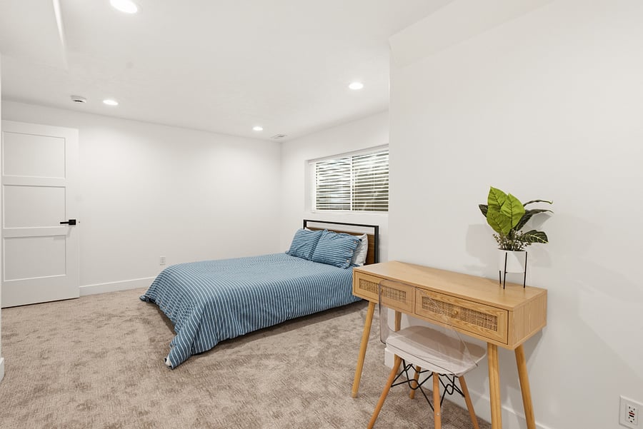Bedroom with walk-in closet