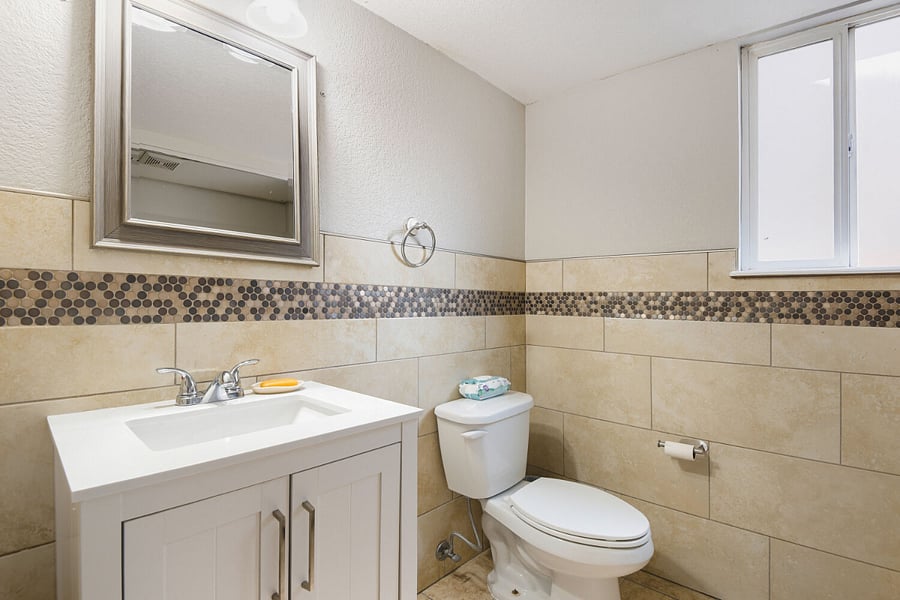 Shared half bathroom in laundry room