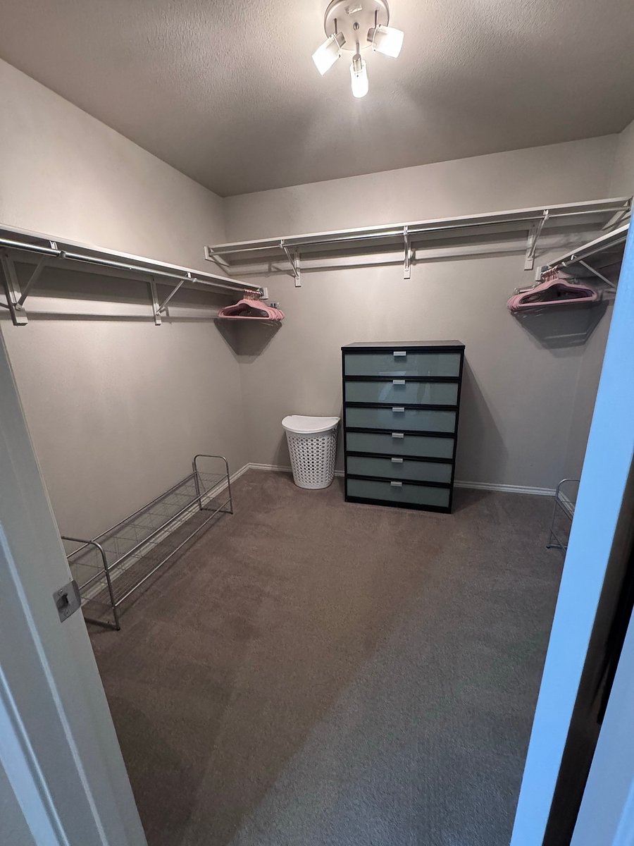 Master bathroom includes: double vanity, large soaker bathtub, shower, toilet, and large walk-in closet