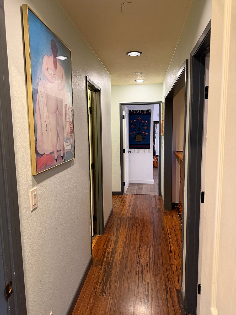 hallway to bathroom, between the 2 offered rooms