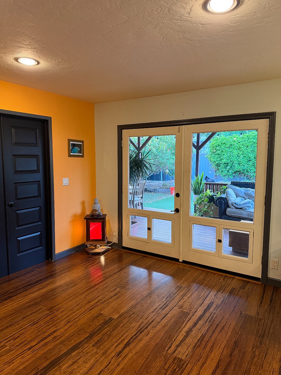 Door to backyard, off of the kitchen and living room