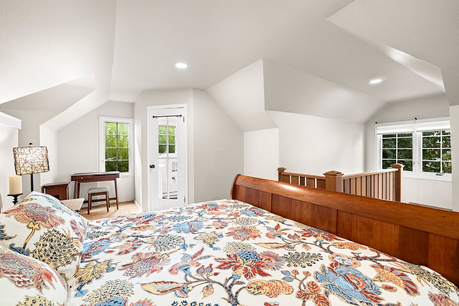 Upstairs sits the King bed in a spacious, airy top floor 'suite'