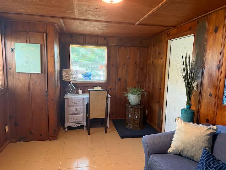 Bedroom #3 is a cabin feel wood room it has a Queen Sofabed Kravet high-end comfortable. Private quiet desk work space. Easy outside access to private back yard,