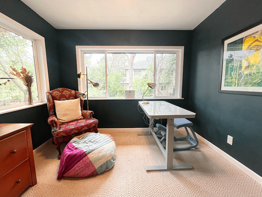 Home office with views of the backyard patio