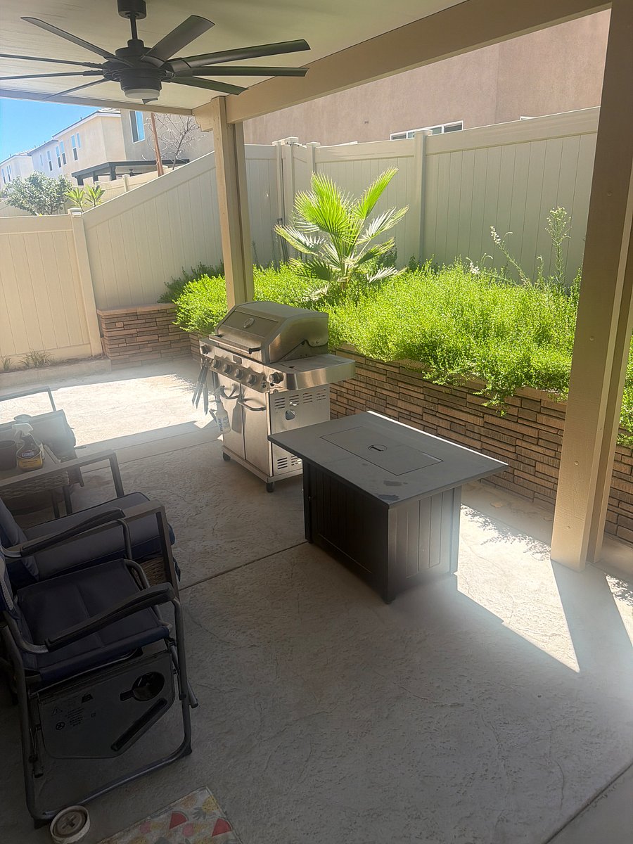 Gas grill on back yard