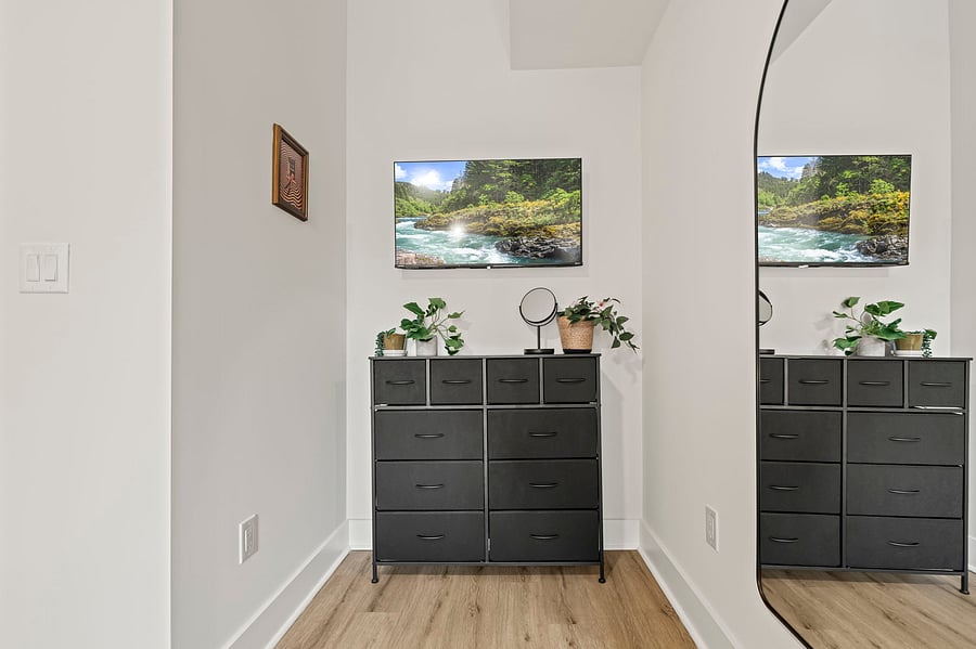 Generous drawer storage and a full-length arched mirror make getting ready for work, class or a night out effortless.