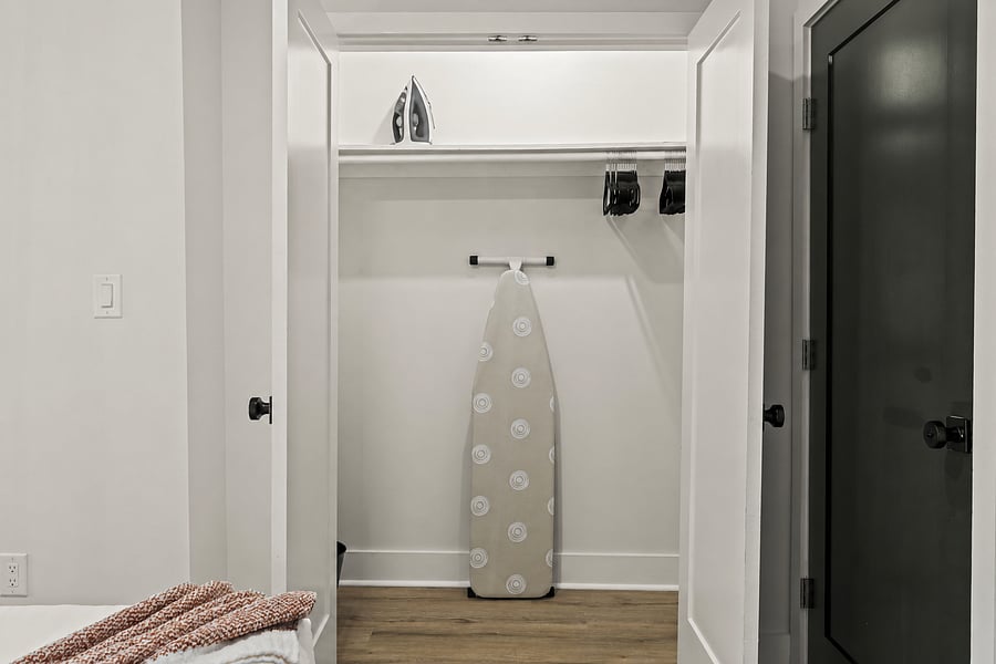 Unpack properly with a spacious closet, hangers ready to go, and an iron and ironing board for crisp scrubs, workwear and interview outfits.