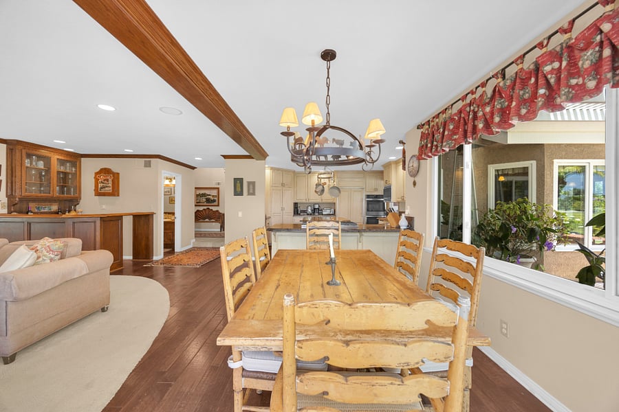 Open kitchen and casual dining area create a warm, connected space for everyday meals, relaxing, and time together.