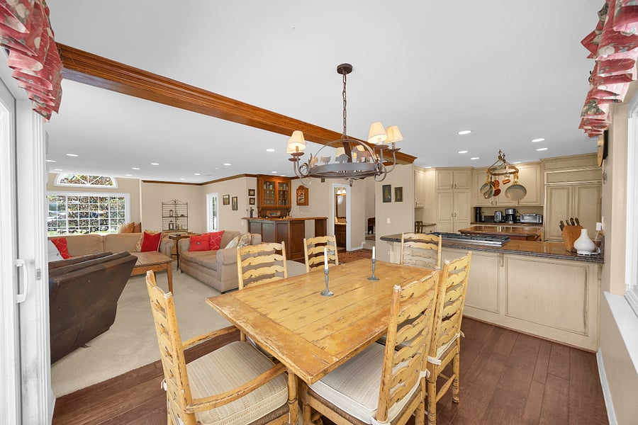 Spacious open-concept kitchen, dining, and family room designed for comfortable everyday living and easy time together.