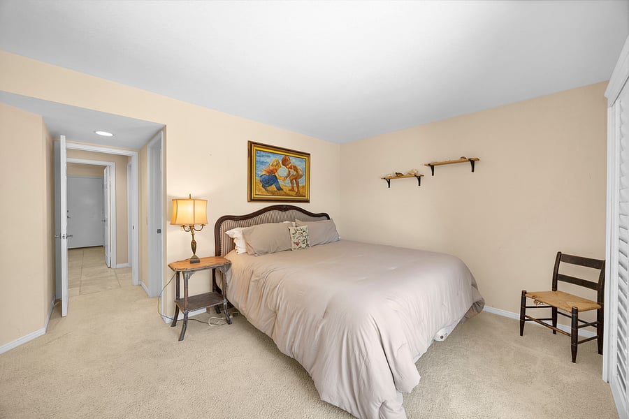 Private first-floor guest suite featuring a California King bed and en suite bathroom, perfect for extended stays and multi-generational groups.