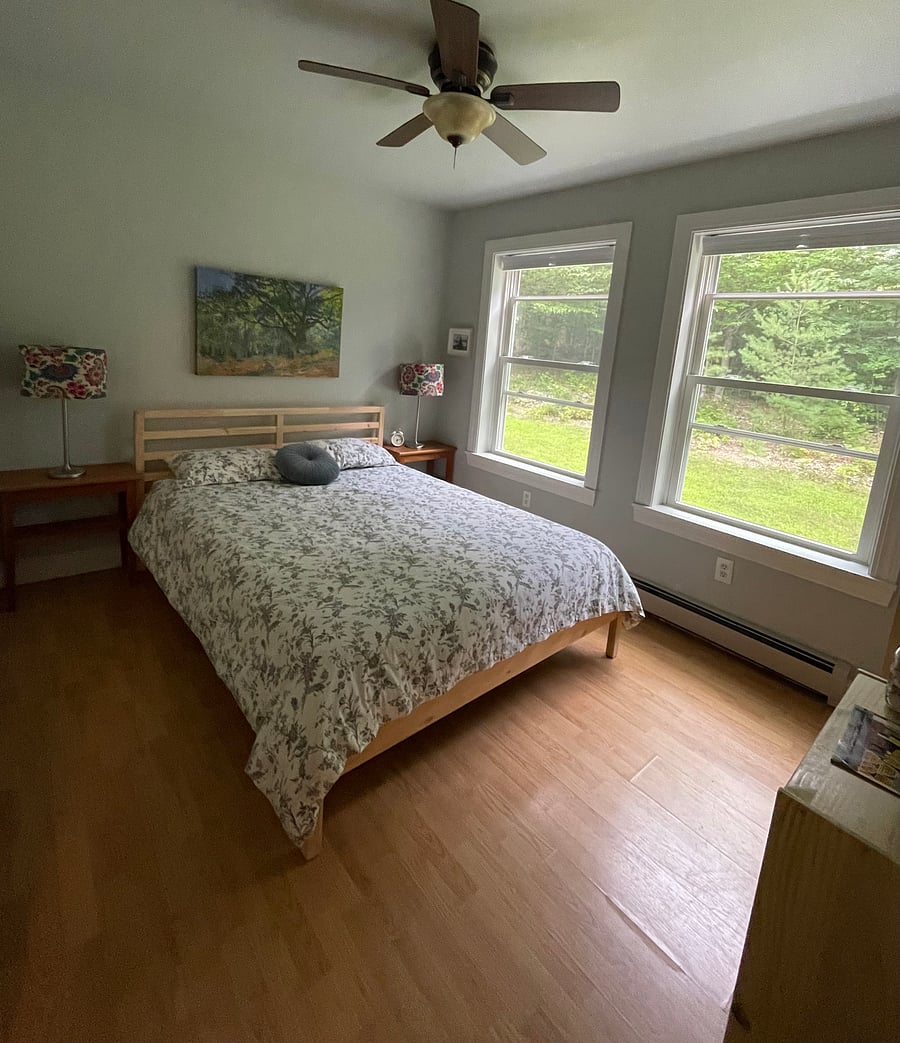 1st floor bedroom with queen bed. Not pictured is the closet with luggage rack, hangers & plenty of storage.