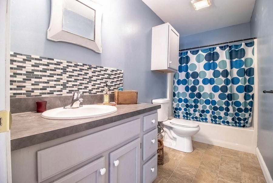 1st floor bathroom with full size bathtub