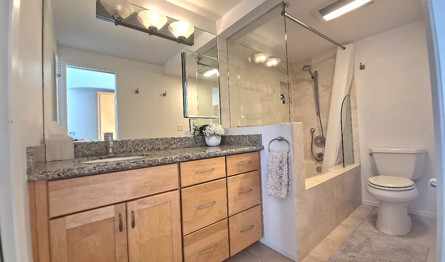 Your own bathroom with tub/shower combo and plenty of storage.