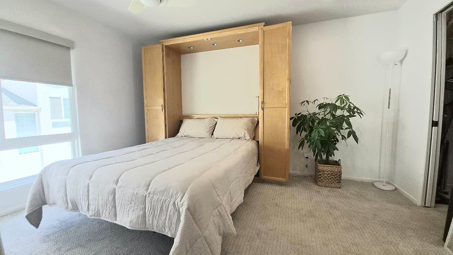 Comfortable murphy bed with 100% cotton linens.