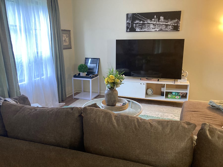 spacious Livingroom with 65 in Smart TV