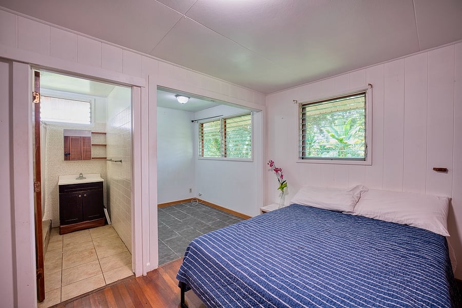 master bedroom with en-suite bathroom and bonus space for a second office, workout space or hobby room.