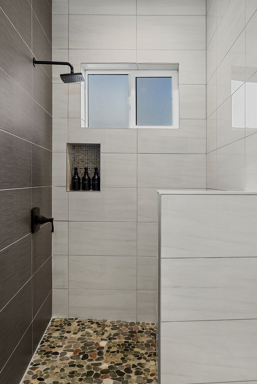 Walk-in shower with modern finishes.
