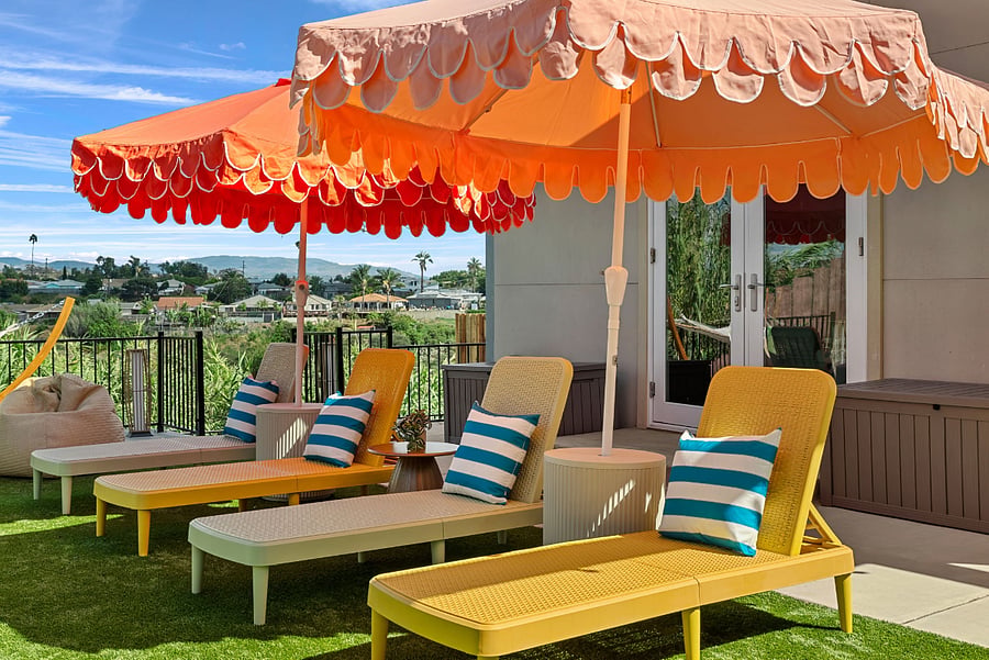 Sunny outdoor louge area with comfortable seating.