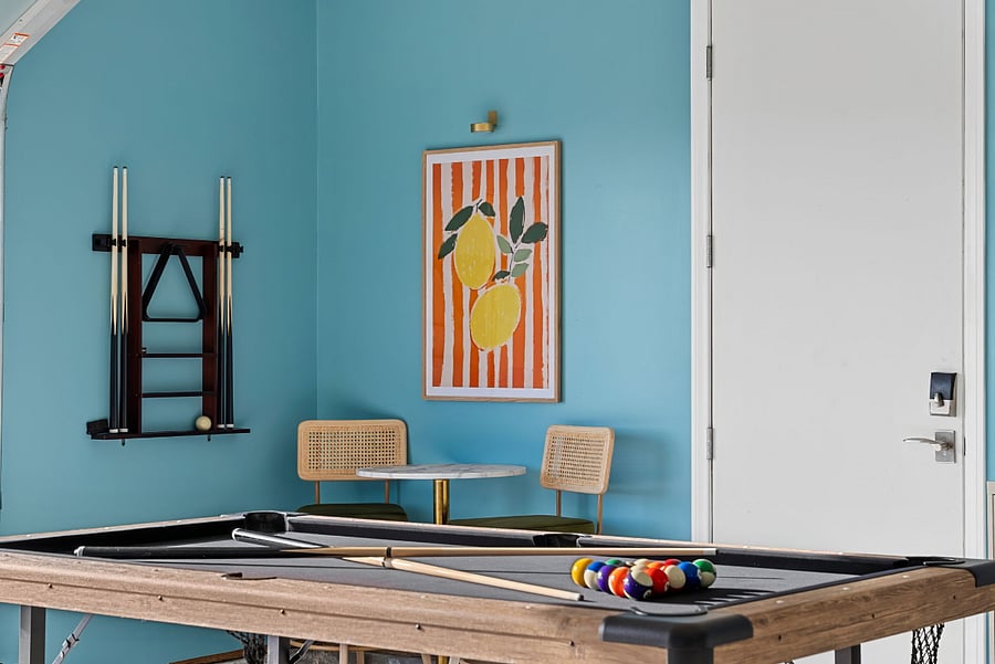 Pool table and wall games for indoor recreation.
