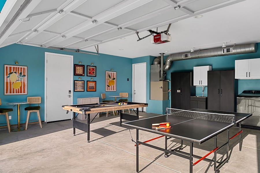 Private game room with pool table and pingpong.