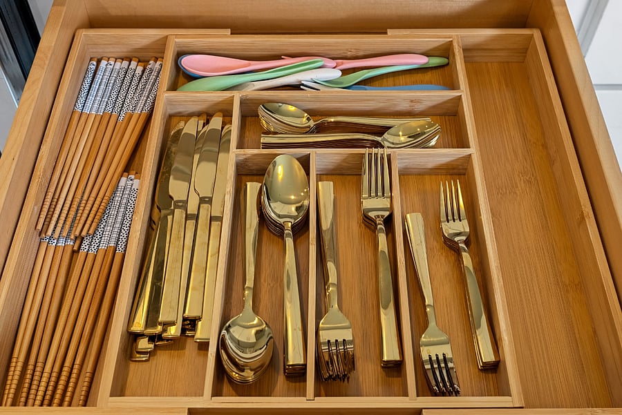 Fully stocked kitchen with silverware, utensils and dining essentials.
