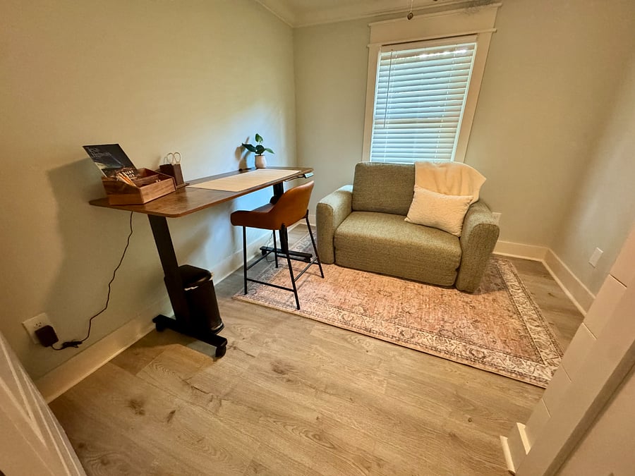 Second bedroom doubles as an office with a twin sized pull out couch and standing desk. Peloton Bike included as well.