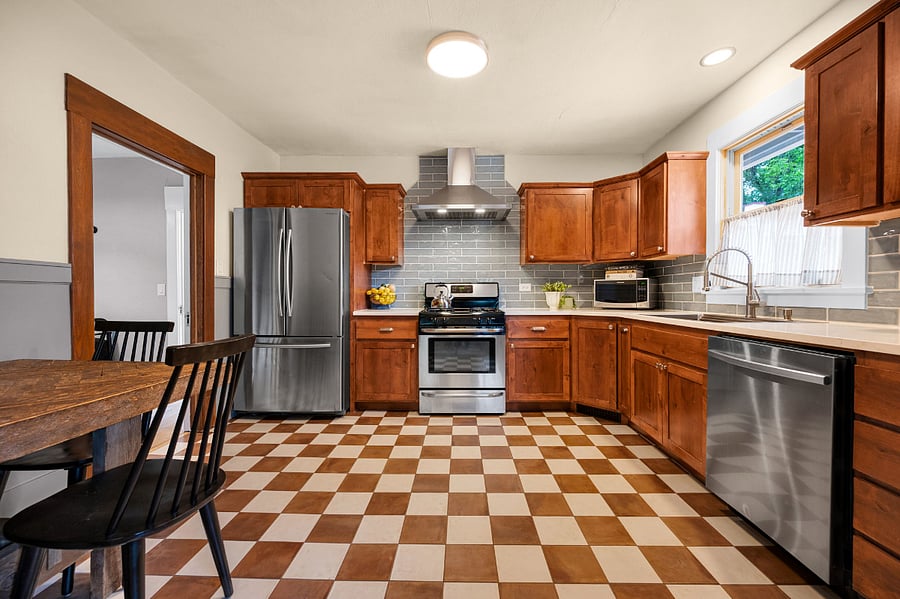 Fully equipped kitchen includes new appliances: full size fridge, gas stove top/oven, microwave, sink and kitchen aid.