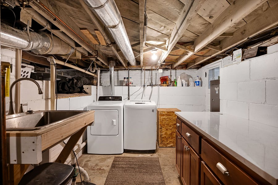 Washer & Dryer, utility sink and basic cleaning products provided. L