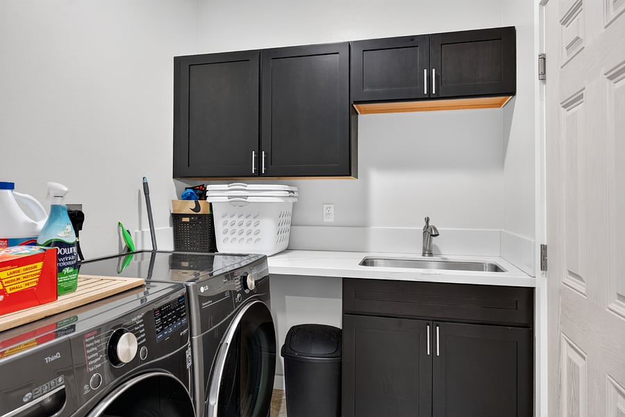 LAUNDRY AREA & ENTRANCE TO GARAGE