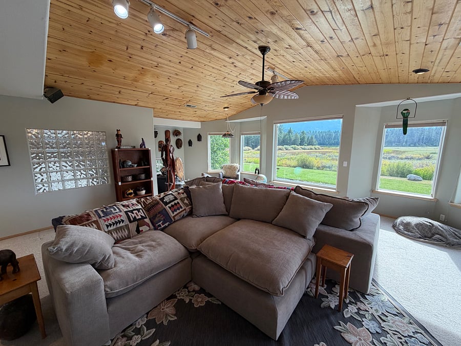 spacious living room with views to die for!