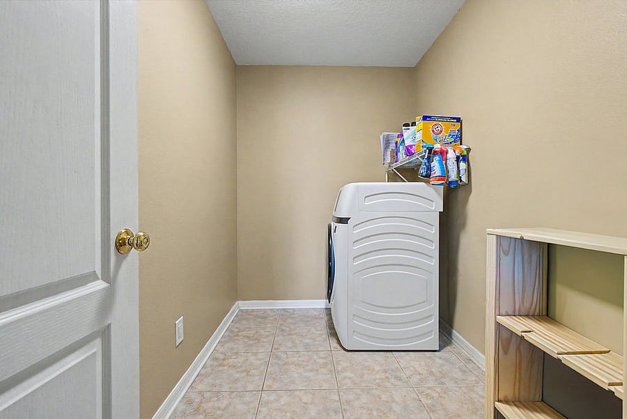 Fully stocked laundry room with plenty of space for wash-day