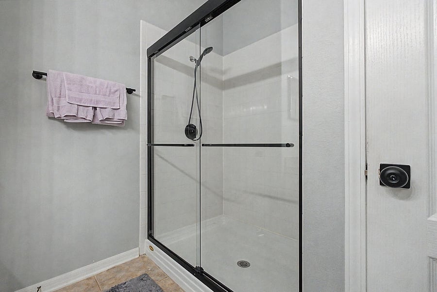 Master bath shower with new door and fixtures
