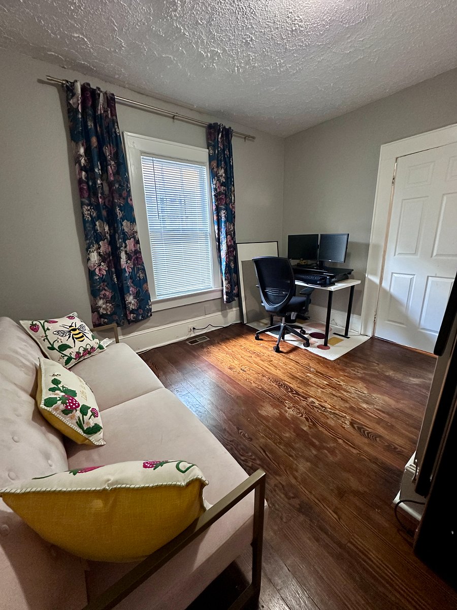 Flex space with office, daybed, laundry room (not pictured) and treadmill (not pictured)