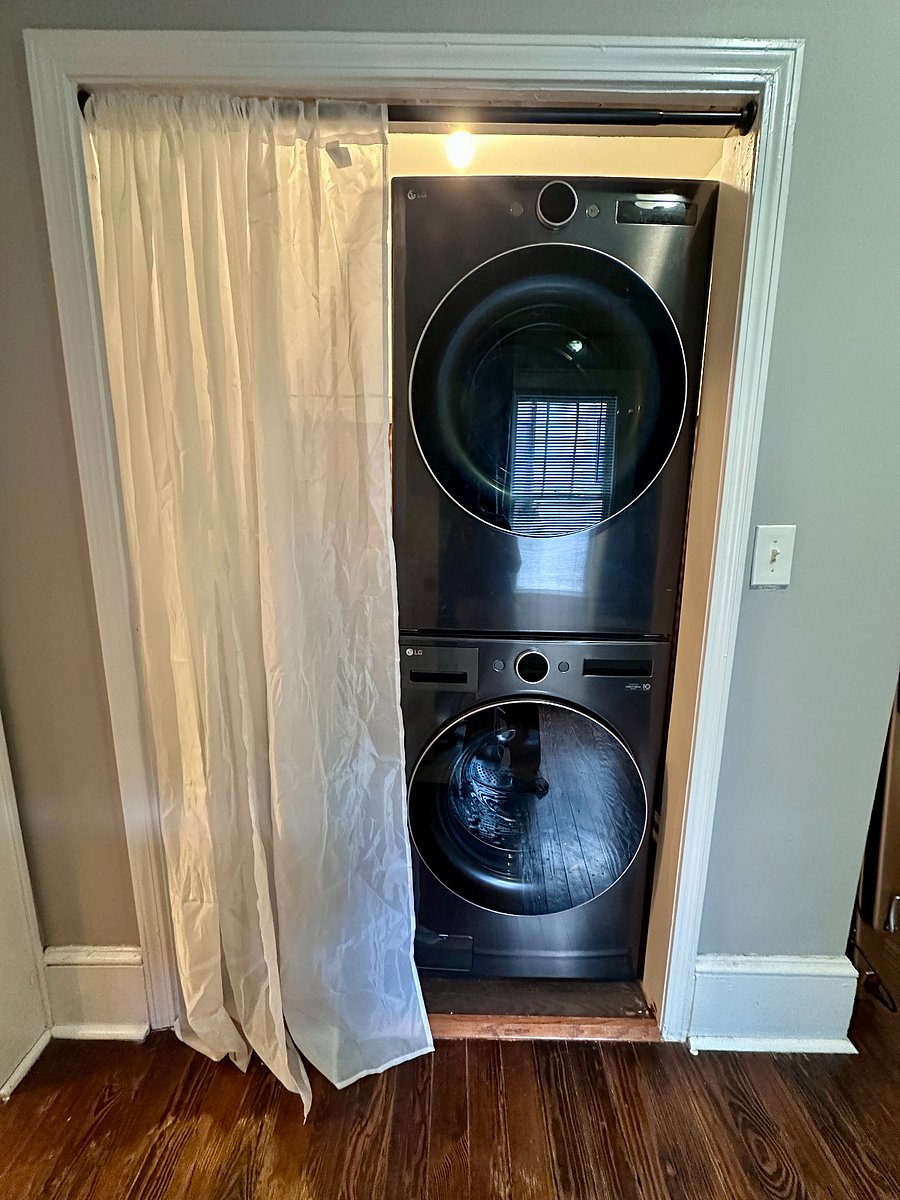 Laundry room with full-sized washer and dryer