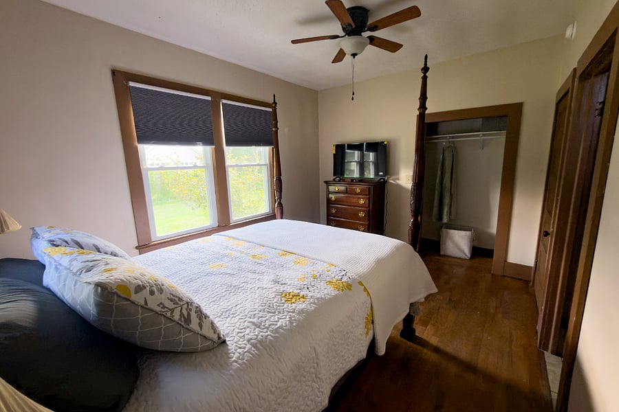 Blackout blinds, a ceiling fan, and nowhere to be until you're ready. The closet and dresser give you room to actually unpack and settle in