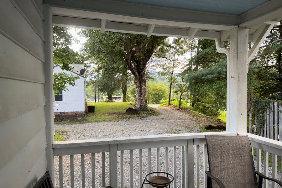 Imagine morning coffee or a cold afternoon drink while the squirrels play under the oak tree.
