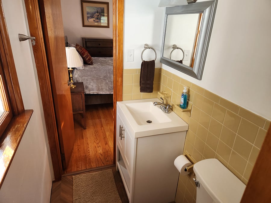 Half bath adjoining bedroom 1