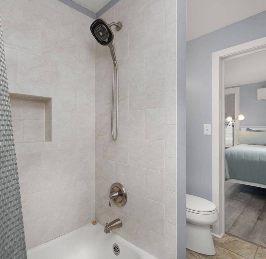 There is shelving across from the toilet to store all your toiletries, extra towels and misc.