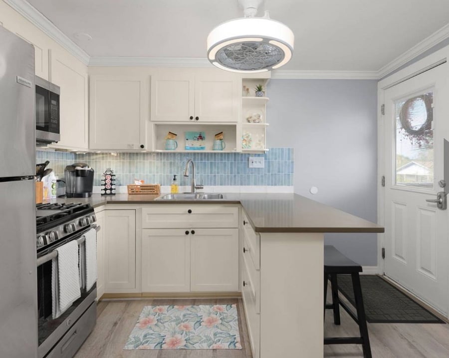 Full kitchen with dining area.