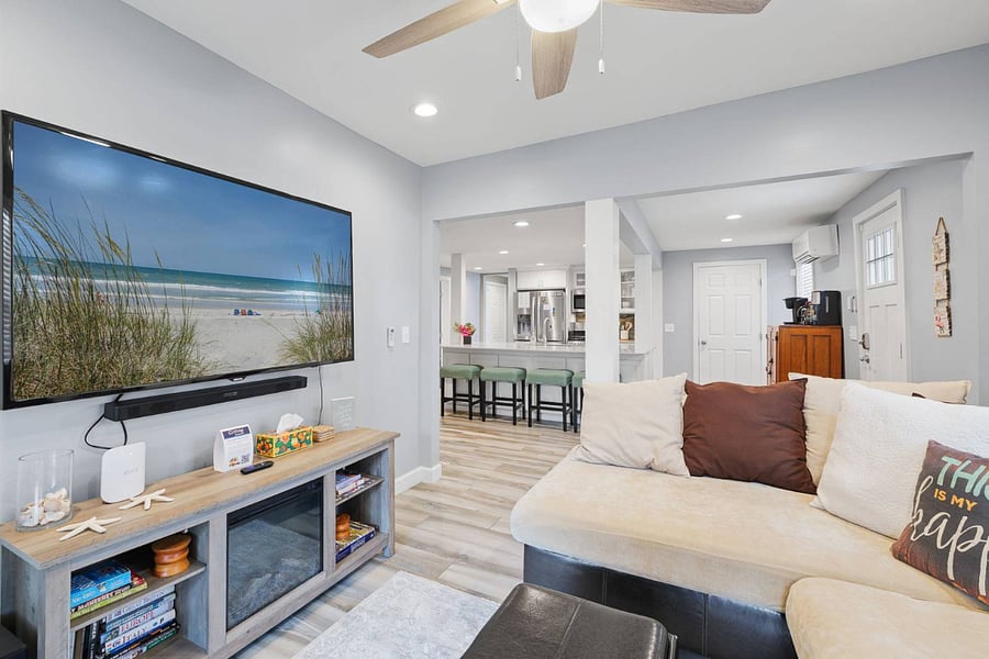 Living room and open kitchen space.  