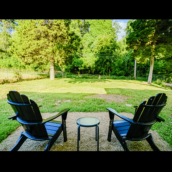 Backyard seating area. Fenced, shady, no neighbors to the back! Enjoy your morning coffee or a glass of wine after work!